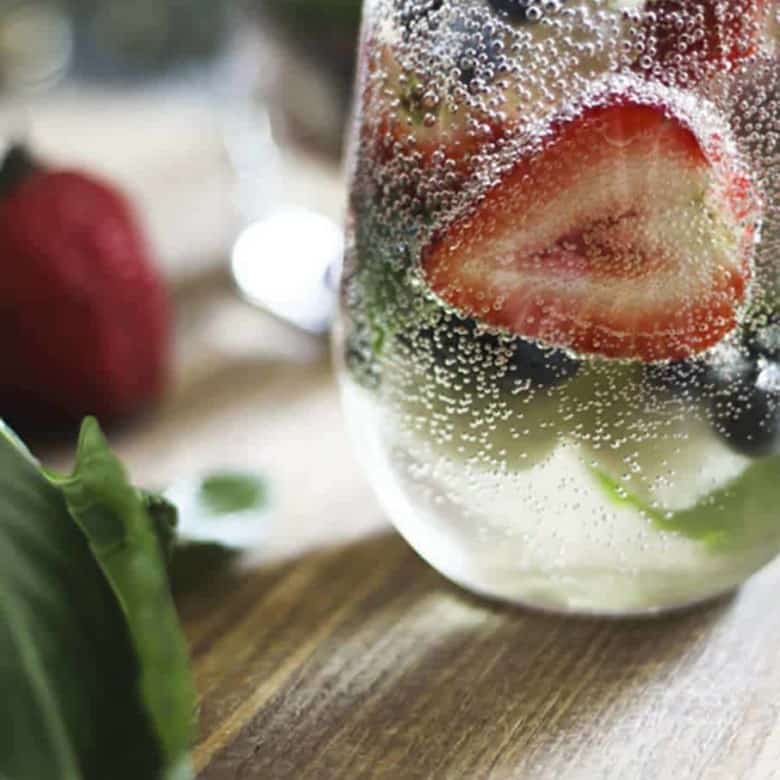 https://www.foodiewithfamily.com/wp-content/uploads/2013/06/Mixed-Berry-Sangria-By-the-Glass-3-780x780.jpg