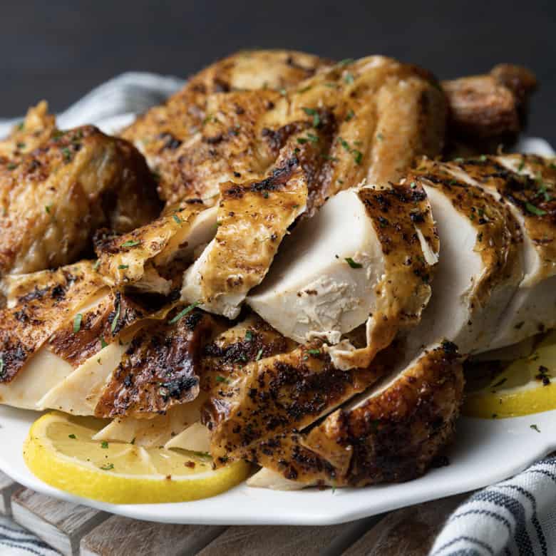 https://www.foodiewithfamily.com/wp-content/uploads/2023/03/air-fryer-whole-chicken-1-780x780.jpg