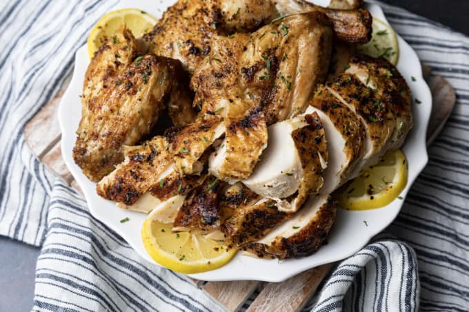 https://www.foodiewithfamily.com/wp-content/uploads/2023/03/air-fryer-whole-chicken-2-680x453.jpg