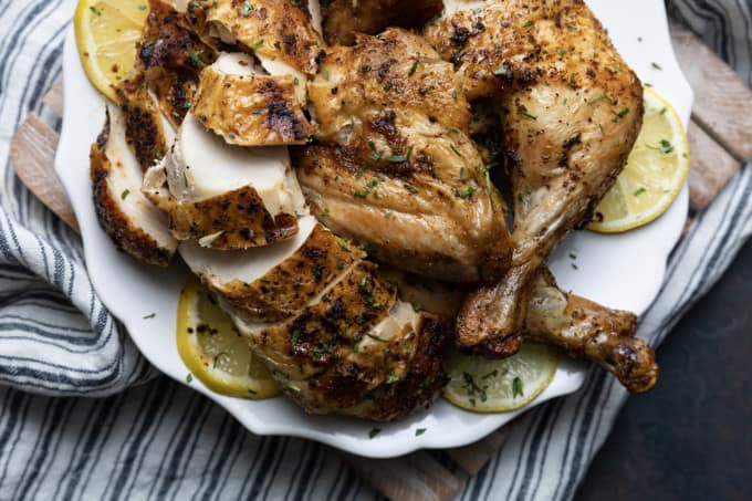 https://www.foodiewithfamily.com/wp-content/uploads/2023/03/air-fryer-whole-chicken-3-680x453.jpg