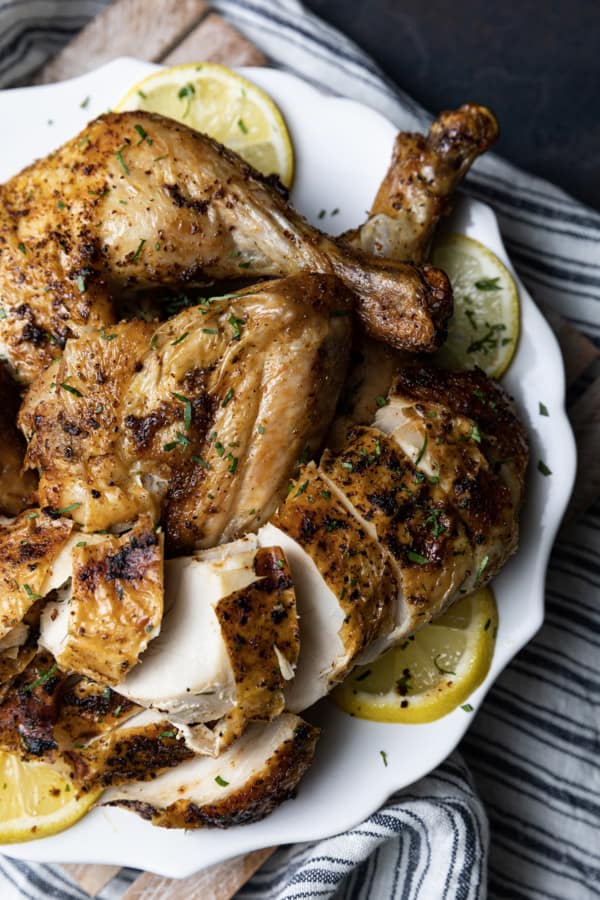 https://www.foodiewithfamily.com/wp-content/uploads/2023/03/air-fryer-whole-chicken-5-600x900.jpg